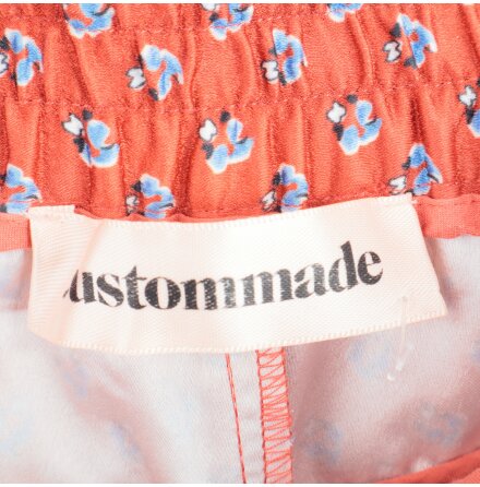 Custommade - Rostrda byxor med mnster - stl. 34